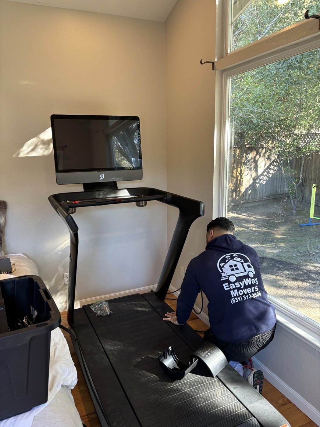 EasyWay crew handling a large item for a pickup and delivery project.